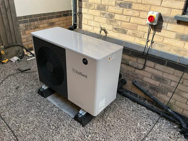 Vaillant aroTHERM heat pump installed on a gravel base
